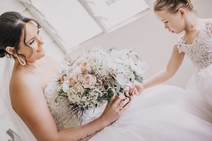 bride and flower girl with blush wedding bouquets from mudgee monkey wedding florist and events 