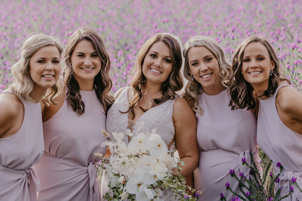 Bride and her bridesmaids with mudgee monkey wedding florist bouquets at the vinegrove wedding venue mudgee. Cordination and wedding florals by the superior Mudgee monkey florist and events