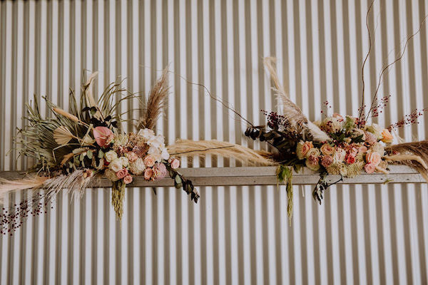 Wedding shed styling by Mudgee monkey wedding and event florist Mudgee pampas grass and dried flowers