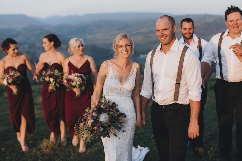 Wedding party with wedding bouquets and buttonholes by Mudgee monkey wedding and event florist with native flowers and king protea.
