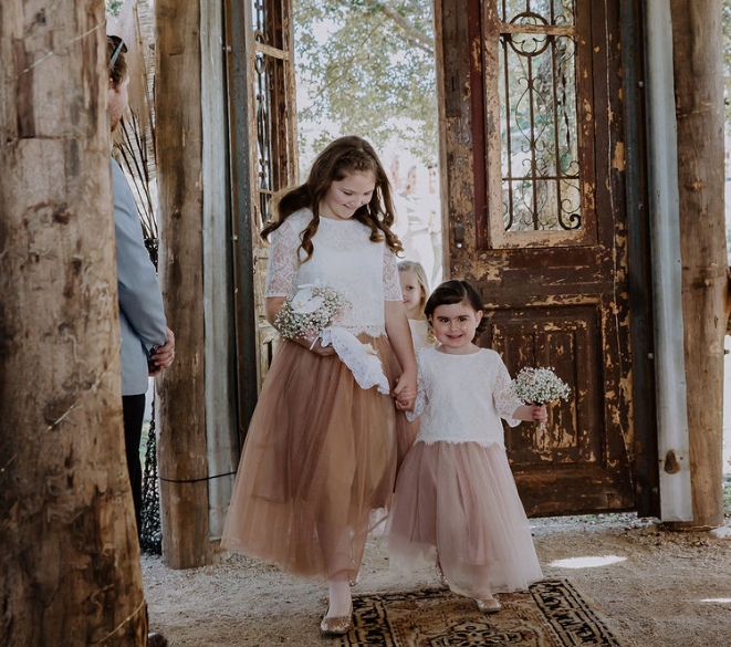Small boho bridesmaids with petite bouquets from Mudgee monkey florist. sweet sisters