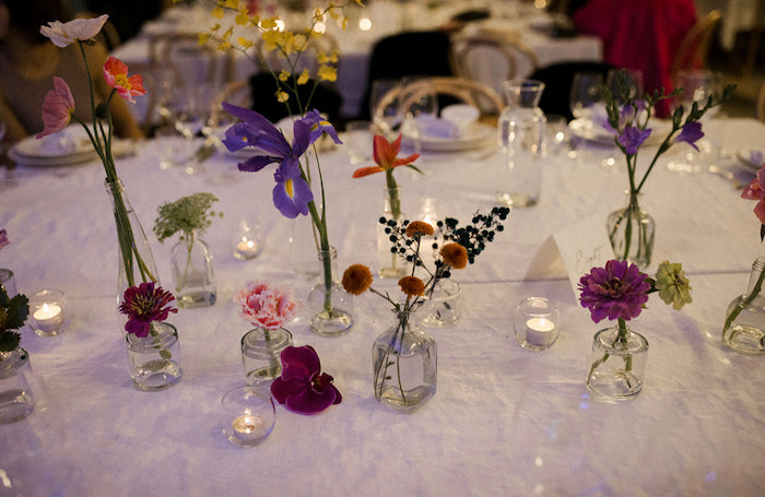 posy vases with pops of colour for this tablescape by Mudgee monkey florist at The pavilion Lowes Mudgee