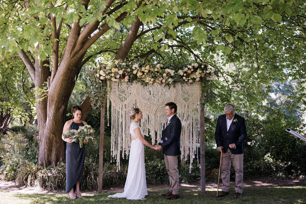 wedding arbour and boho hanging mudgee wedding florals, styling and coorindation by Mudgee monkey florist. At mudgee wedding venue Evanslea