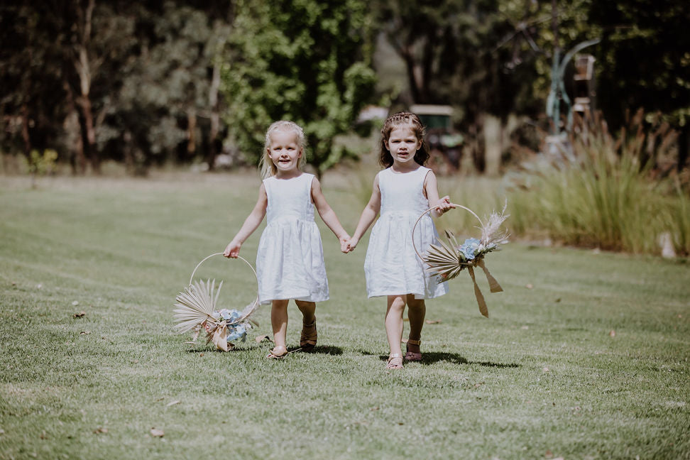 flower grils hoops by mudgee monkey wedding and event florist at The vinegrove mudgee wedding venue and wedding florist mudgee